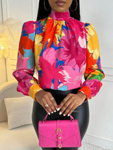 Stay Elegant in This Lightweight Mock Neck Top with Flowy Ruffle Layers